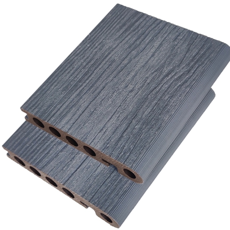 Wood-plastic composite co-extruded flooring